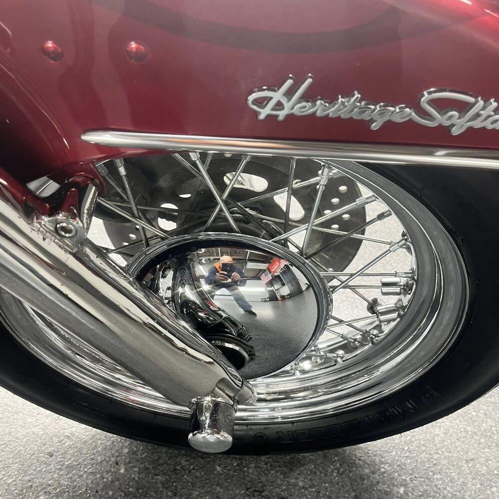Polished chrome and candy-red paint on a detailed motorcycle